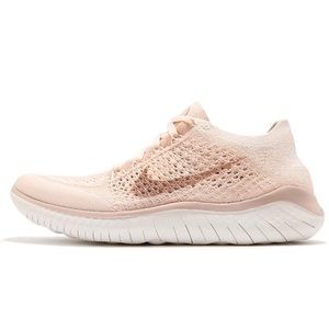Nike free rn flyknit in guava ice (size 6)